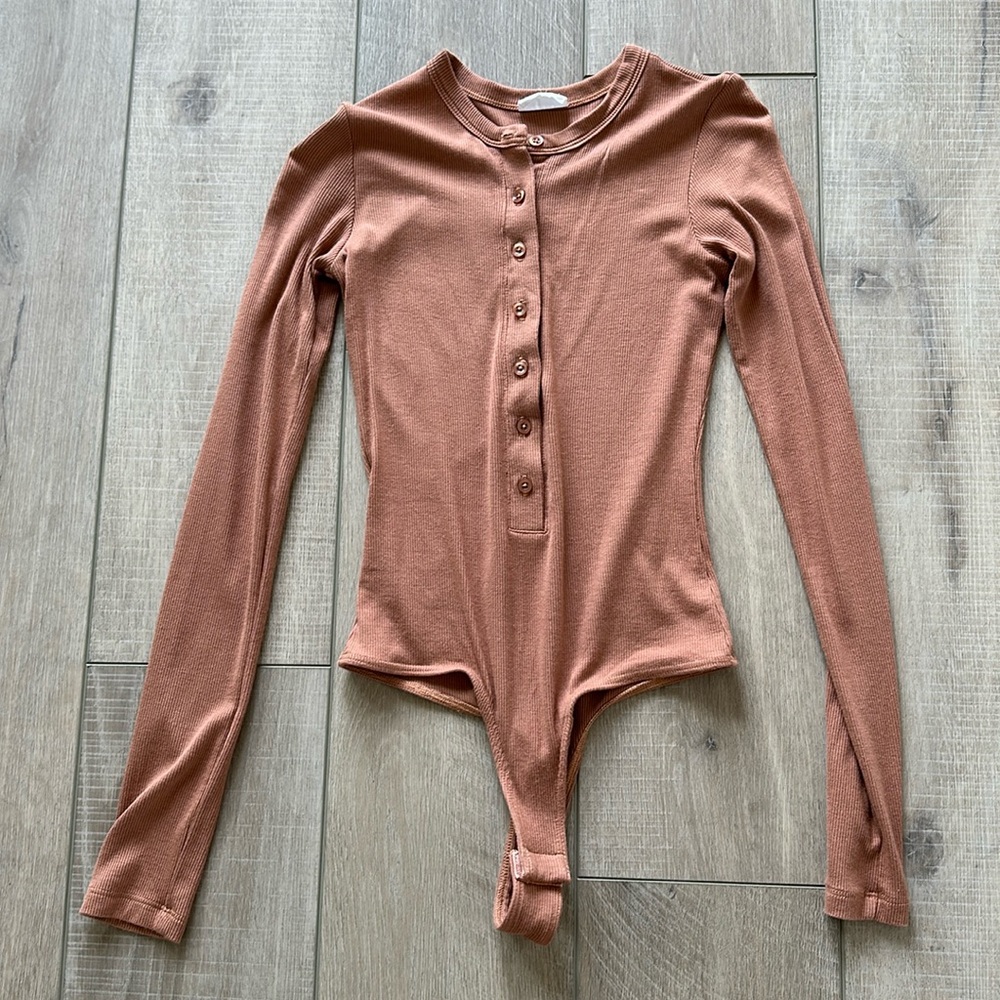 clique body suit with button detail